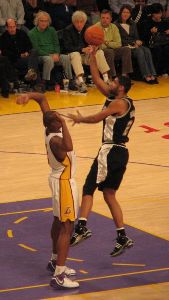 Tim Duncan : Tim Duncan going up for a shot over the Lakers  Andrew Bynum.