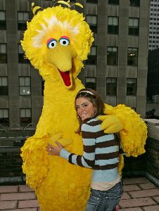 Maria Menounos with th yellow Big Bird pictures