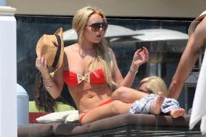 Drug Addict Lindsay Lohan red bikini pictures