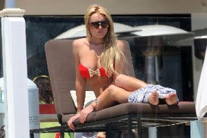 Drug Addict Lindsay Lohan red bikini pictures