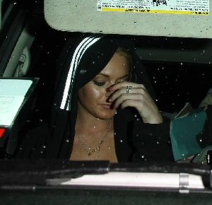 Drug addict Lindsay Lohan at the night of her DUI pictures