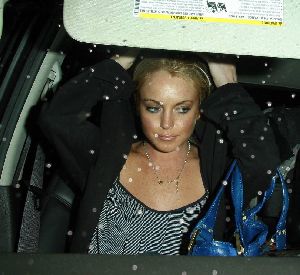 Drug addict Lindsay Lohan the night of her DUI pictures