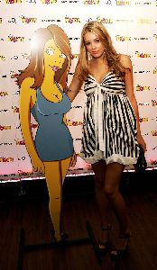 Keeley Hazell with the Simpson’s clone at the UK premiere of The Simpson Movie