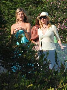 Actress Jennifer Aniston pictures wearing a blue sundress