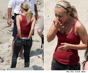 Cute Hayden Panettiere pictures at posted by TMZ, these two pictures of Hayden Panettiere picking he