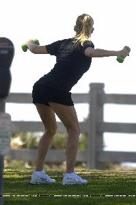 Singer Fergie doing some exercise pictures