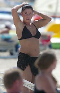 Actress  Jessie Wallace black bikini pictures