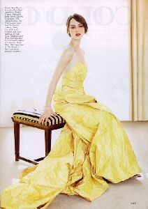 Actress Keira Knightly pictures in Flare Magazine wearing a long yellow dress