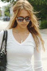 Sexy Jessica Alba picture in Venice wearing a white shirt and black sunglasses on August 25th 2007