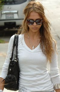 Sexy Jessica Alba picture in Venice wearing a white shirt and black sunglasses on August 25th 2007