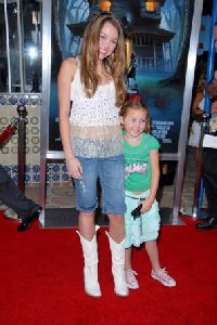 Miley Cyrus arrives with her little sister Noah at Monster House Los Angeles Premiere on July 17th, 2006 in Westwood, California