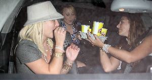 Hot Britney Spears picture/pic eating fast food  with her friend inside a car