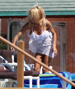 Sexy Pamela Anderson white bikini pics at her Malibu beach house