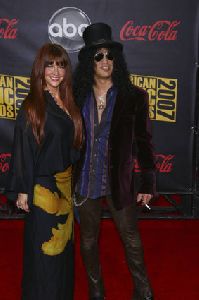 Perla Ferrar and Slash pictures at 2007 American Music Awards