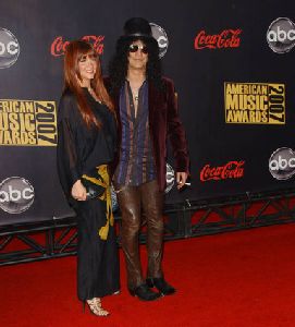 Perla Ferrar and Slash pictures at 2007 American Music Awards