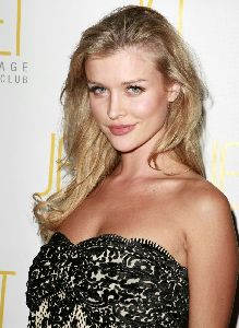 Sexy Joanna Krupa pictures at the launch party for her 2008 calendar