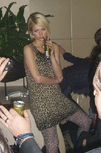 Sexy Paris Hilton pictures while promoting her new drink (RICH) in Europe