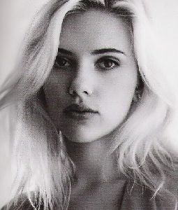 Sexy black and white Scarlett Johansson cleavage pictures at Elle Magazine