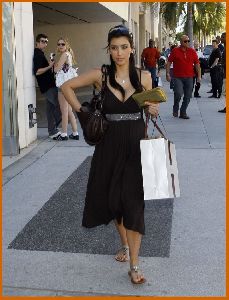 Kim Kardashian on the streets wearing a summer brown dress In Beverly Hills on February 28th 2008