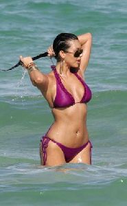 Kim Kardashian purple bikini picture at the beach in Florida in August 2007