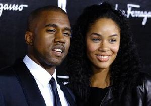 Alexis Phifer and Kanye West on the red carpet