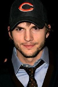 Ashton Kutcher wearing a cap