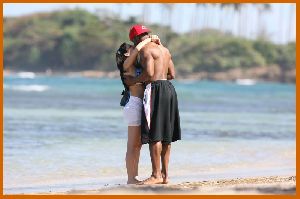 Kim Kardashian and Reggie Bush on the beach in the Dominican Republic on March 5th 2008