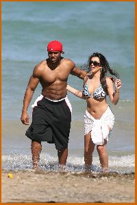 Kim Kardashian and Reggie Bush on the beach in the Dominican Republic on March 5th 2008