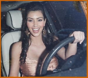 Kim Kardashian riding her car back home after Kim Kardashian Getting A Manicure on March 25th 2008