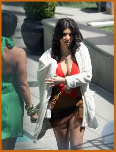 Kim Kardashian orange bikini picture on April 9th 2008