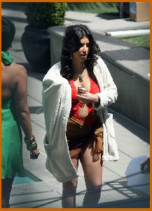 Kim Kardashian orange bikini picture on April 9th 2008