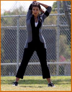 Kim Kardashian working out some morning stretches on April 20th 2008