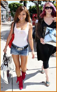 Tila Tequila was seen on the streets of Beverly hills wearing a mini-denim shorts and a red high heels boots on the 29th of July 2008