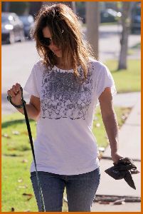 Rachel Bilson out in jeans walking the dog