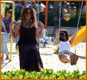 Khloe Kardashian with Kourtney at the park