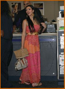 Kim Kardashian get some pictures developed at her local Kinkos shop in Los Angeles, California on June 6th 2008