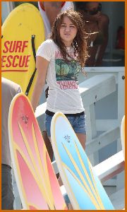 Miley Cyrus spotted wearing denim shorts on the filming set of Hannah Montana on the beaches of Malibu on July 9th 2008