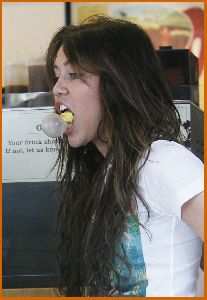 Miley Cyrus photo for a new episode of Hannah Montana at Malibu beach on July 9th 2008