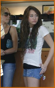 Miley Cyrus photo for a new episode of Hannah Montana at Malibu beach on July 9th 2008