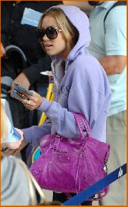 Lauren Conrad : Lauren Conrad in c-thru tank top under a purple hoodie at LAX airport6 4885dae555cc3