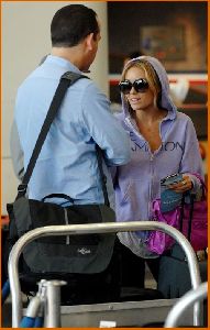 Lauren Conrad : Lauren Conrad in c-thru tank top under a purple hoodie at LAX airport7 4885dae557f78