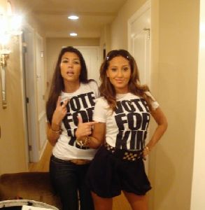 adrienne bailon and Kourtney kardashian wearing Vote For Kim tshirts on September 14th 2008 for dancing with the stars TEAM KARDASHIAN campaign