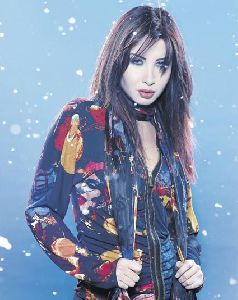 nancy ajram : a snow magazine poster