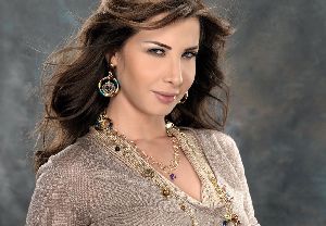 nancy ajram : nancy ajram posing lately for an interview about her musical award winning