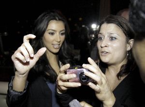 Kim Kardashian : Kim at Gypsy Bar in Boston with a fan- November 7th