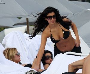 the girls Kim and Kourtney Kardashian with Kristin Cavallari at the Miami Beach