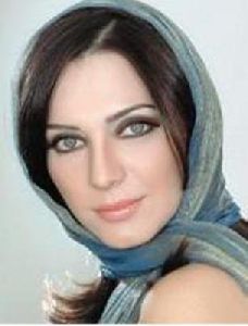 Sulaf Fawakherji : wearing a scarf