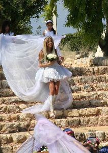 Dana Halabi : dana as a bride at her movie clip wearing a wedding dress