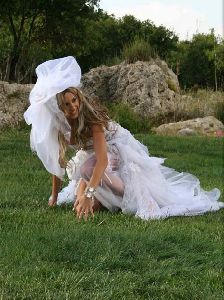 Dana Halabi : dana pictures as a bride at her movie clip wearing a wedding dress