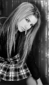 Dana Halabi : dana wearing a checkered skirt - black and white